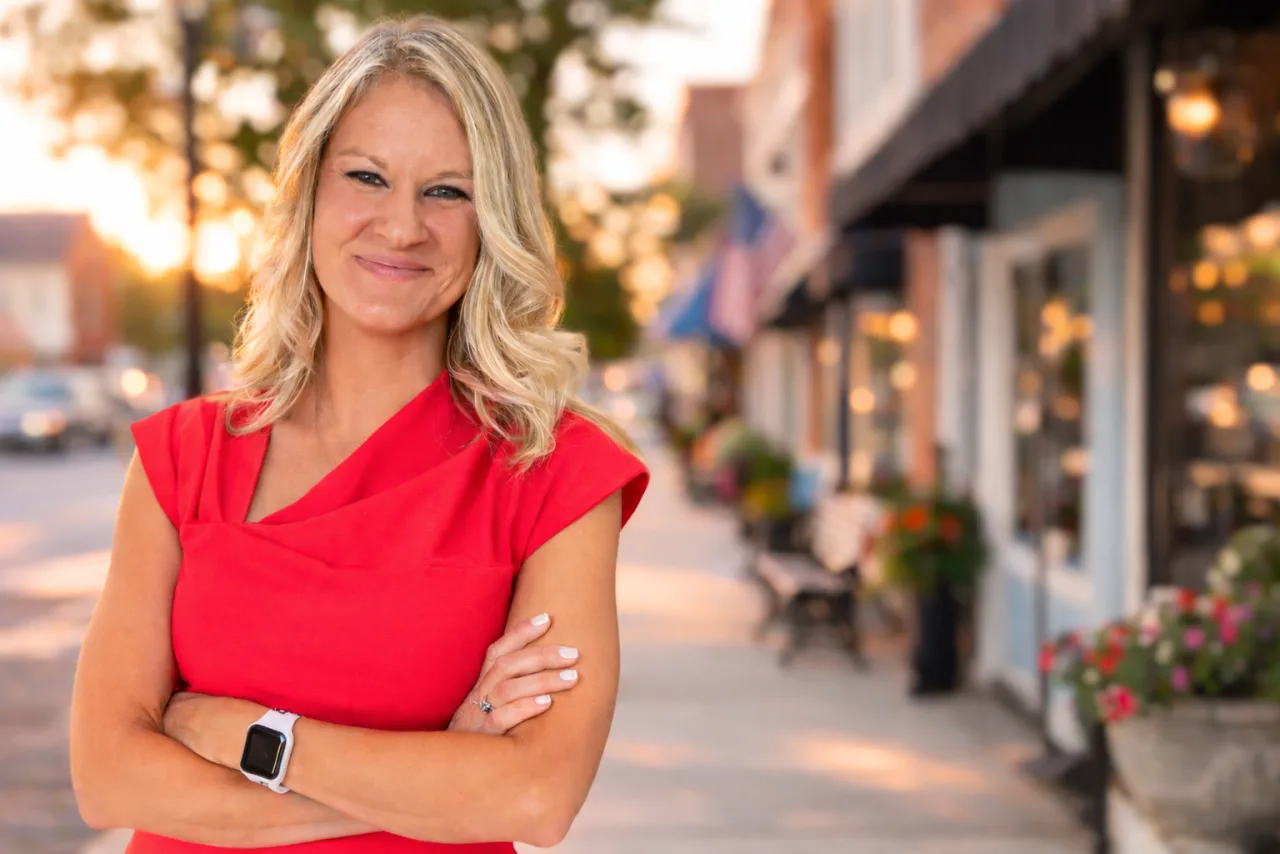 Sarah Blessing on a main street in District 70 at sunset