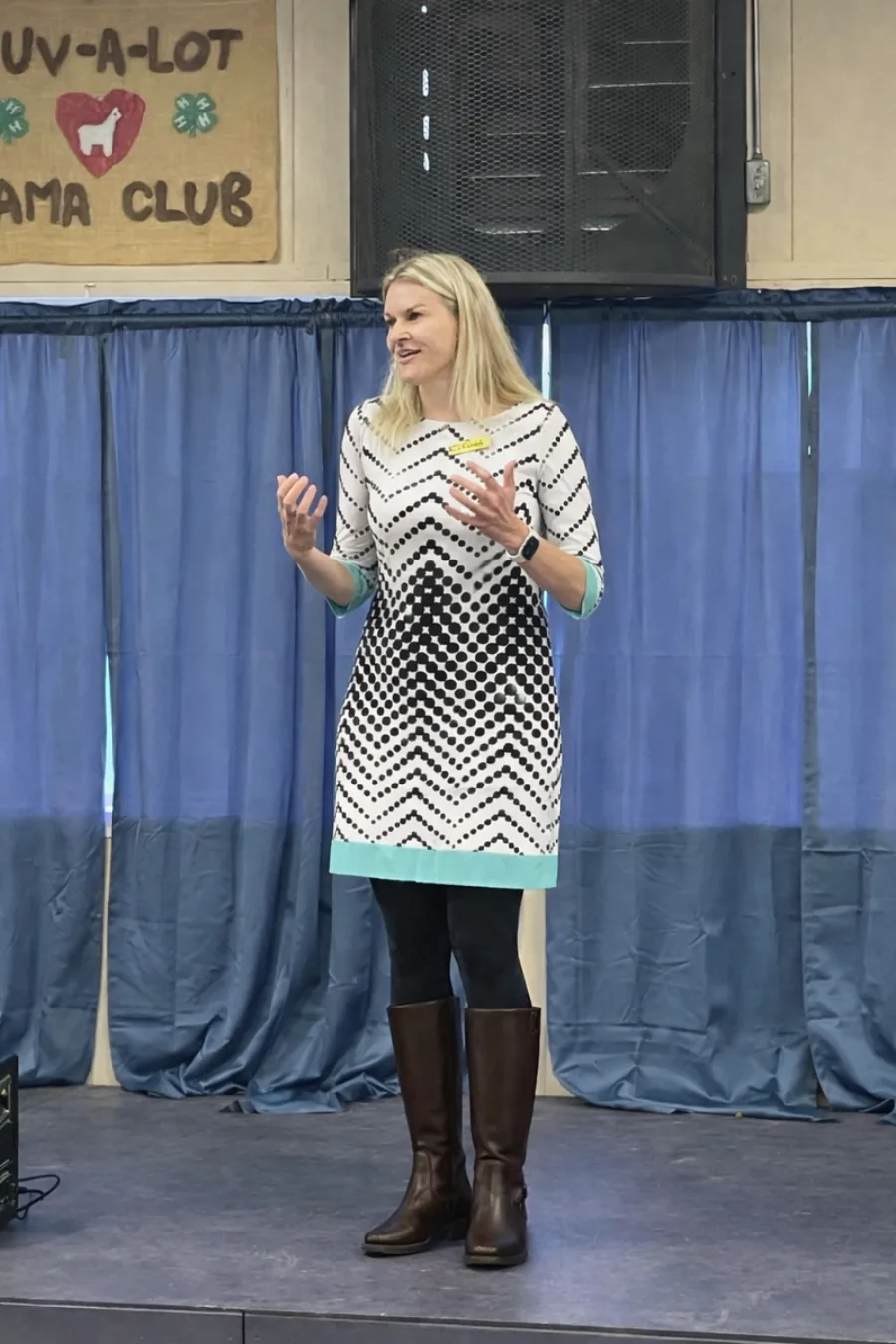 Sarah speaking at a 4-H event
